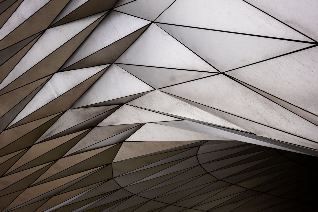 Close-up of geometric architectural detail with futuristic design in Lyon, France.